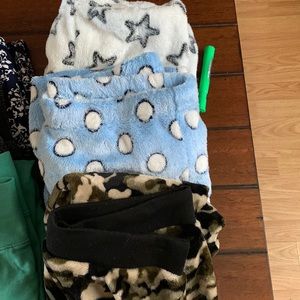 3 pajama pants large.100%polyester. Soft and furry very comfortable!